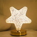 Lampada da tavolo a forma di stella